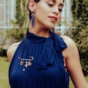 Gold and crystal brooch